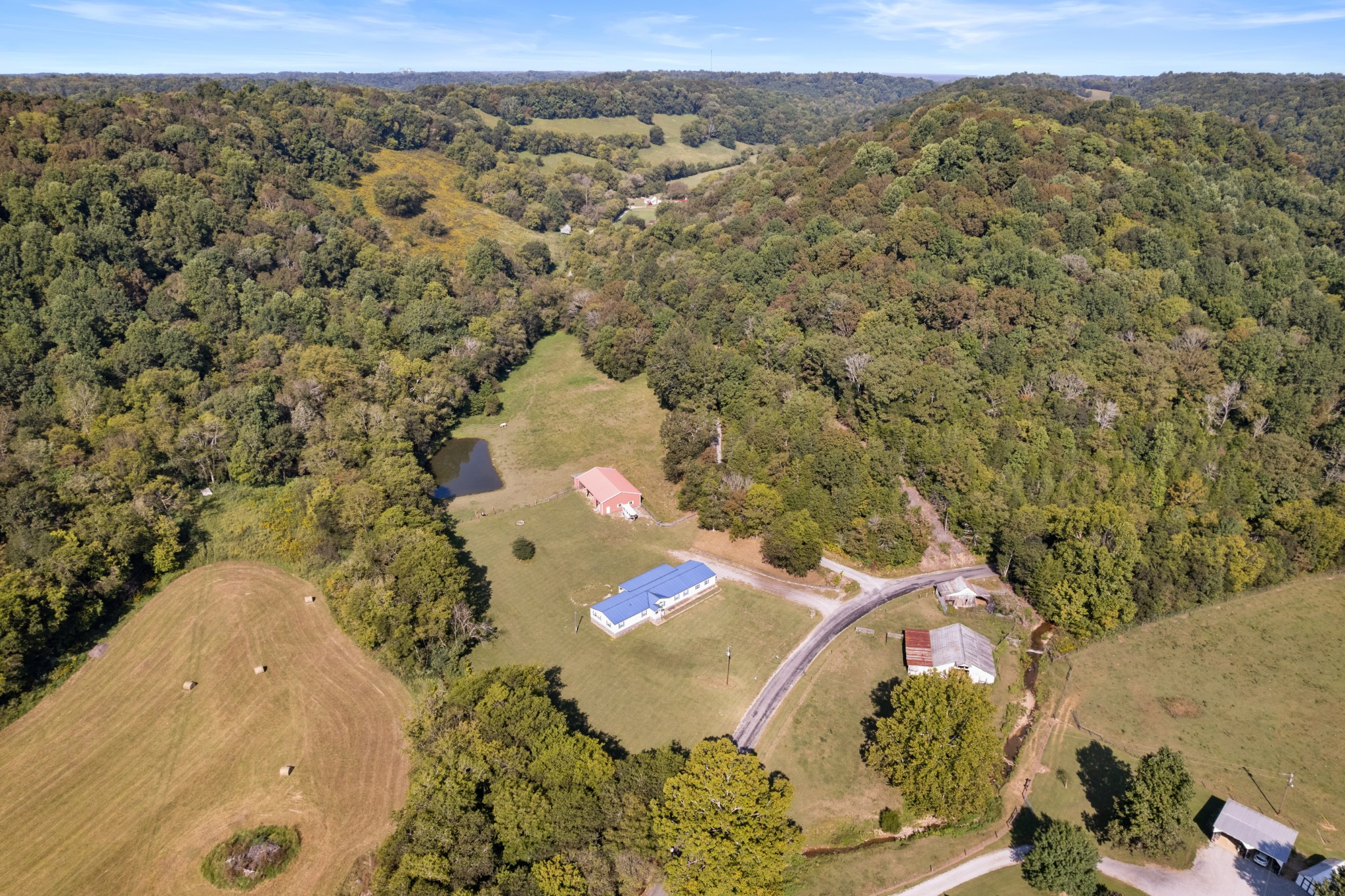 2600 Creecy Hollow Road Pulaski, TN 38478 - Photo 39 of 47 an aerial view of a house with a mountain