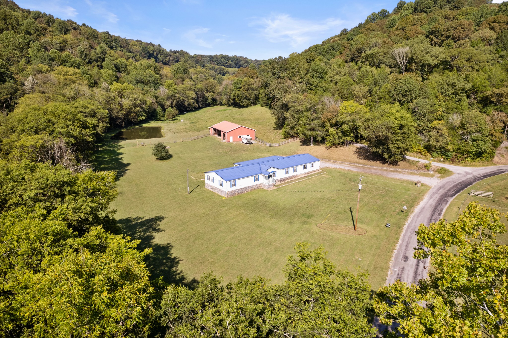 2600 Creecy Hollow Road Pulaski, TN 38478 - Photo 47 of 47 a view of a lake with a mountain in the background