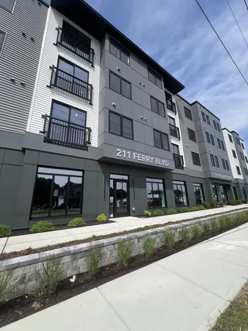 a view of a building with a street