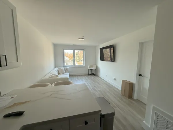 a bathroom with a toilet and shower