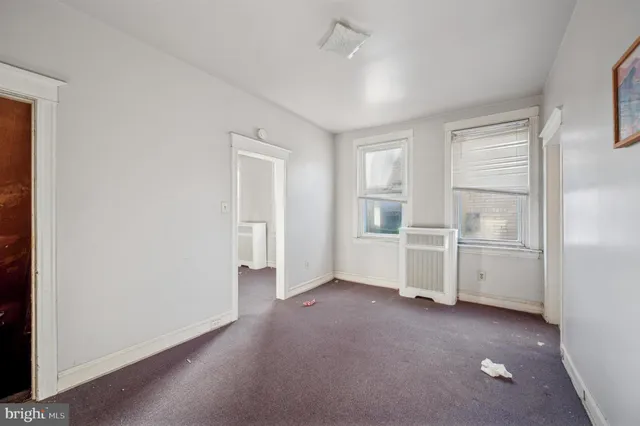 an empty room with windows