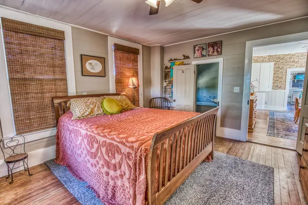 a bedroom with furniture