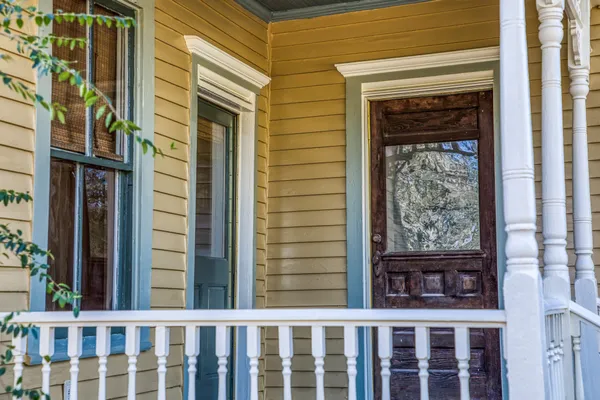 a view of a balcony from a door