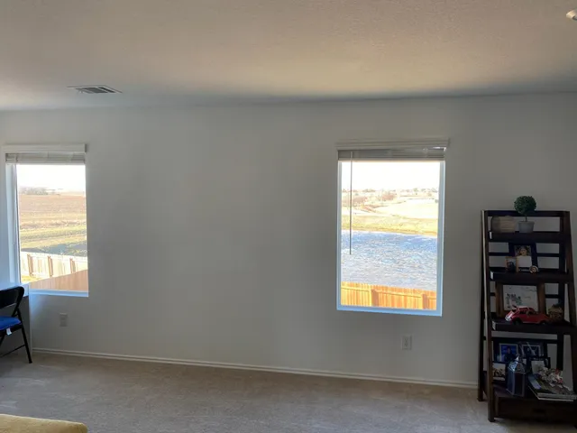 an empty room with a window