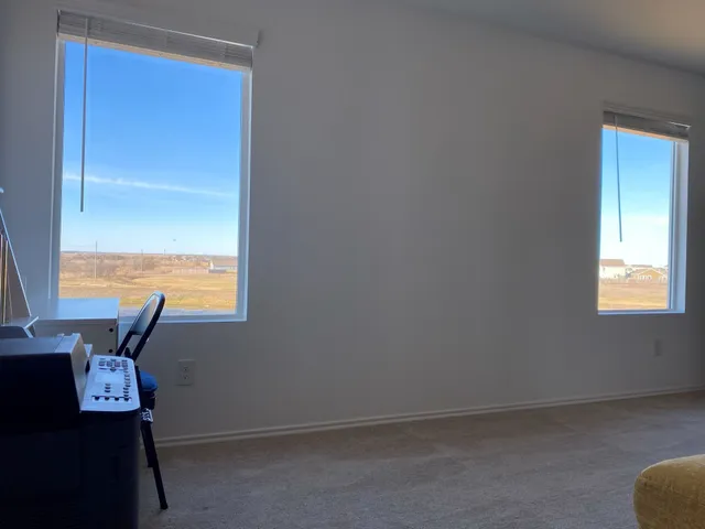 a view of workspace room with window