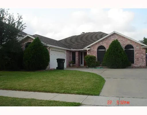 a view of a yard in front of a house