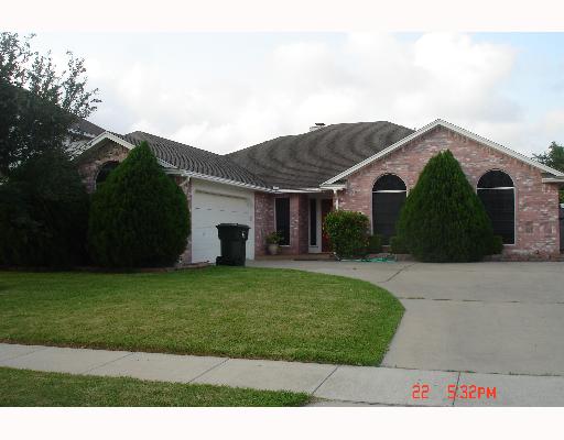 a view of a yard in front of a house