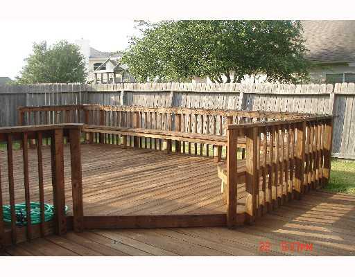 5022 Queen's Court Corpus Christi, TX 78413 - Photo 4 of 9 a view of a balcony with wooden floor