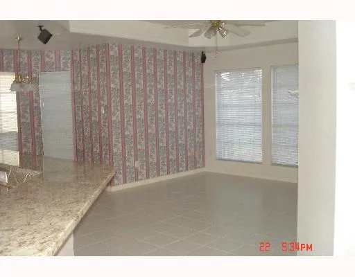 a view of an entryway with a wall