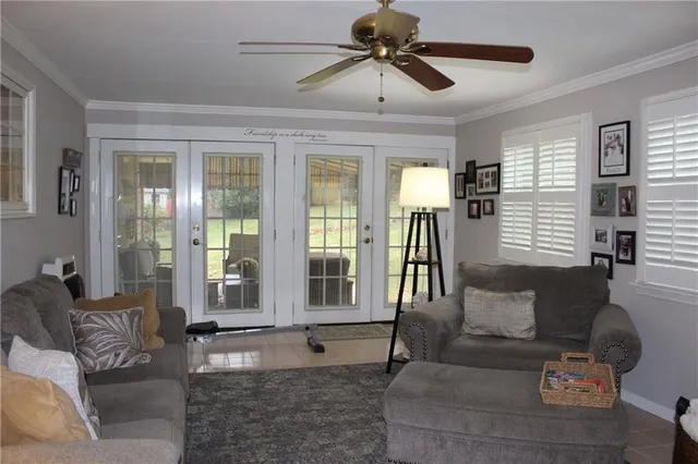 a living room with furniture and a window