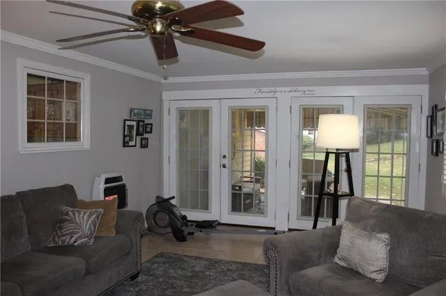 a living room with furniture and a window