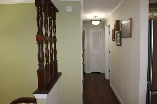 a view of hallway with stairs