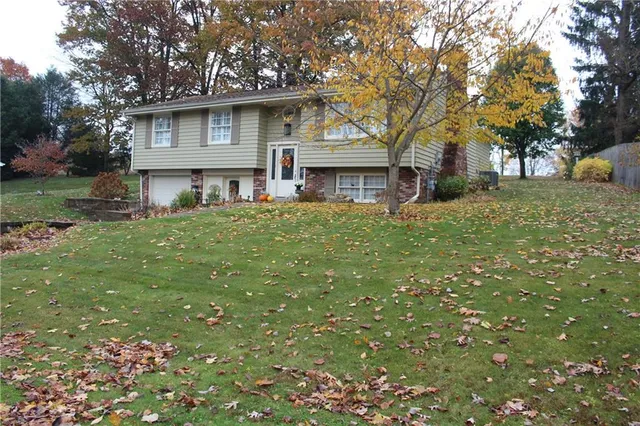 a house view with a garden space