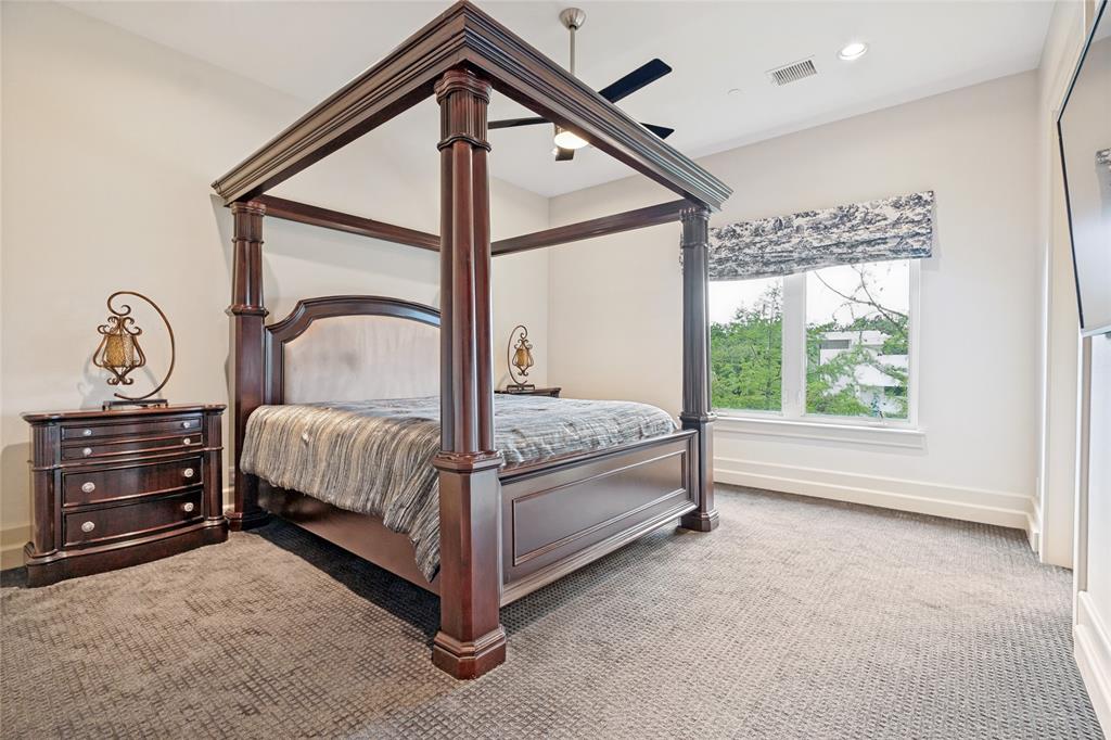 6432 Sudbury Road Plano, TX 75024 - Photo 32 of 38 a bedroom with a bed and a window