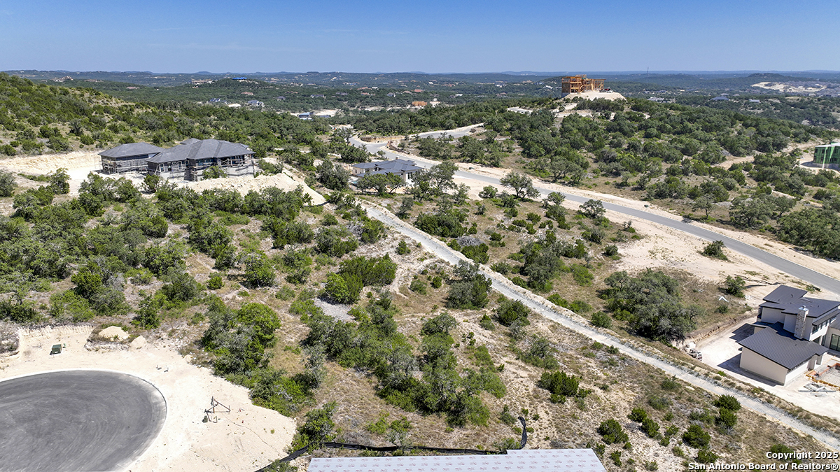 23328 Ebner Ridge San Antonio, TX 78255 - Photo 14 of 29 an aerial view of residential houses with outdoor space