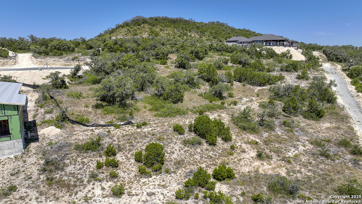 23328 Ebner Ridge San Antonio, TX 78255 - Photo 23 of 29 a view of a garden with a building