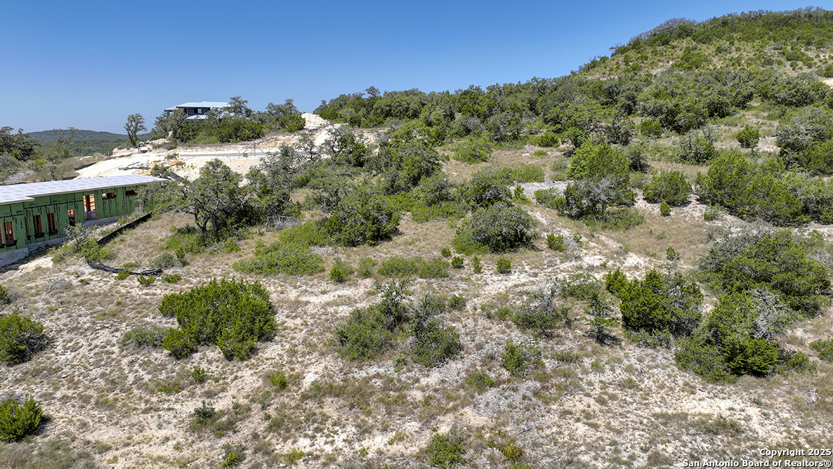 23328 Ebner Ridge San Antonio, TX 78255 - Photo 24 of 29 a view of a houses with a yard