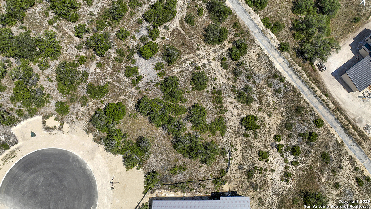 23328 Ebner Ridge San Antonio, TX 78255 - Photo 9 of 29 an aerial view of a house with a yard