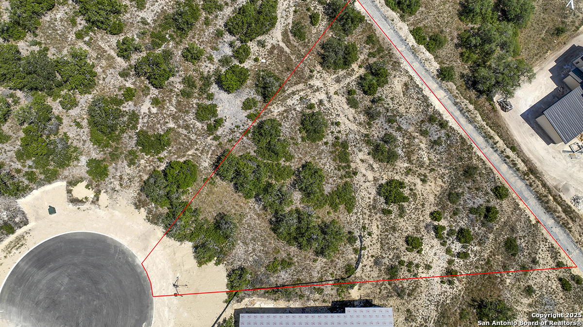 23328 Ebner Ridge San Antonio, TX 78255 - Photo 10 of 29 an aerial view of a house with yard