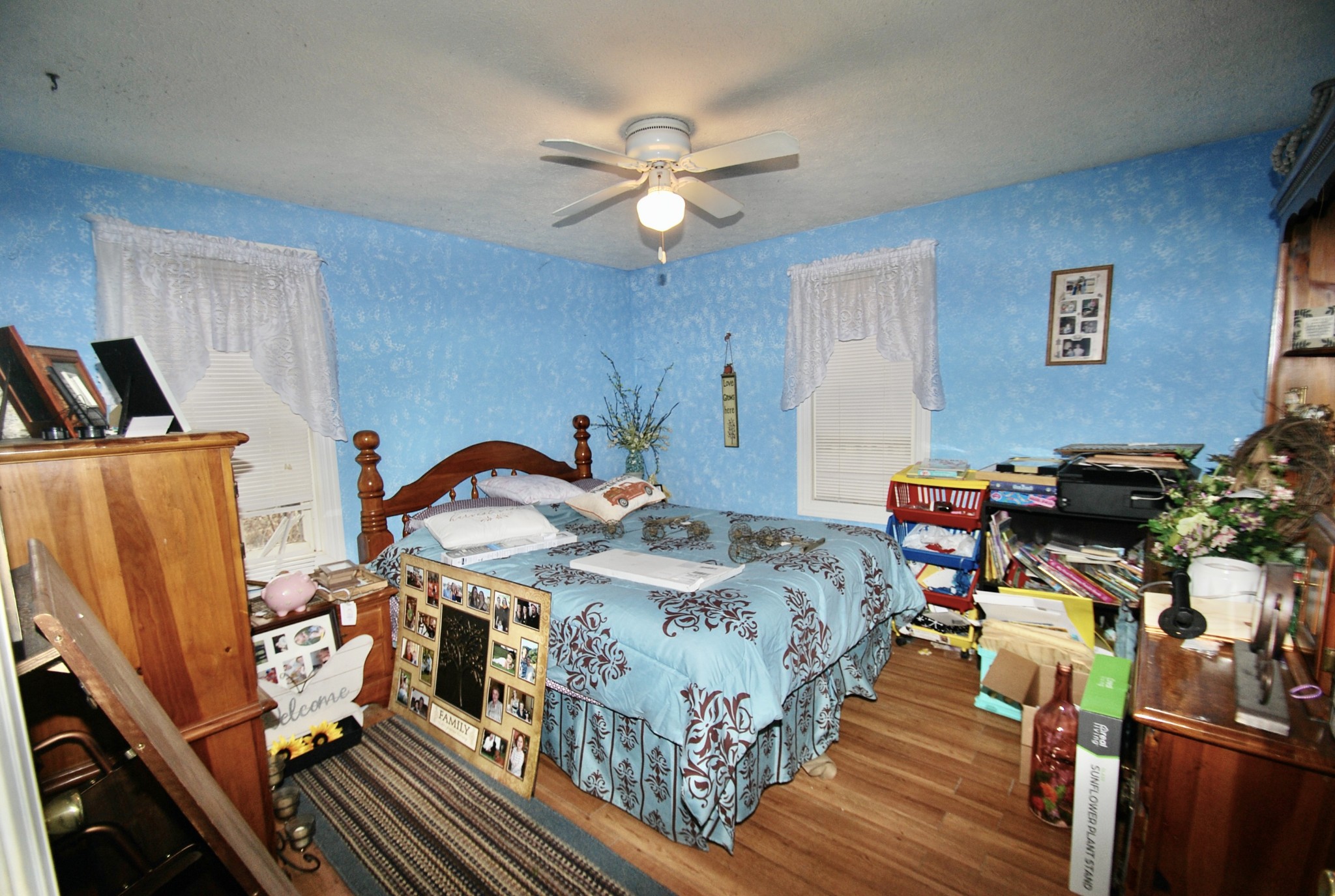 6006 Valley Road Springfield, TN 37172 - Photo 14 of 15 a bedroom with bed and a chandelier