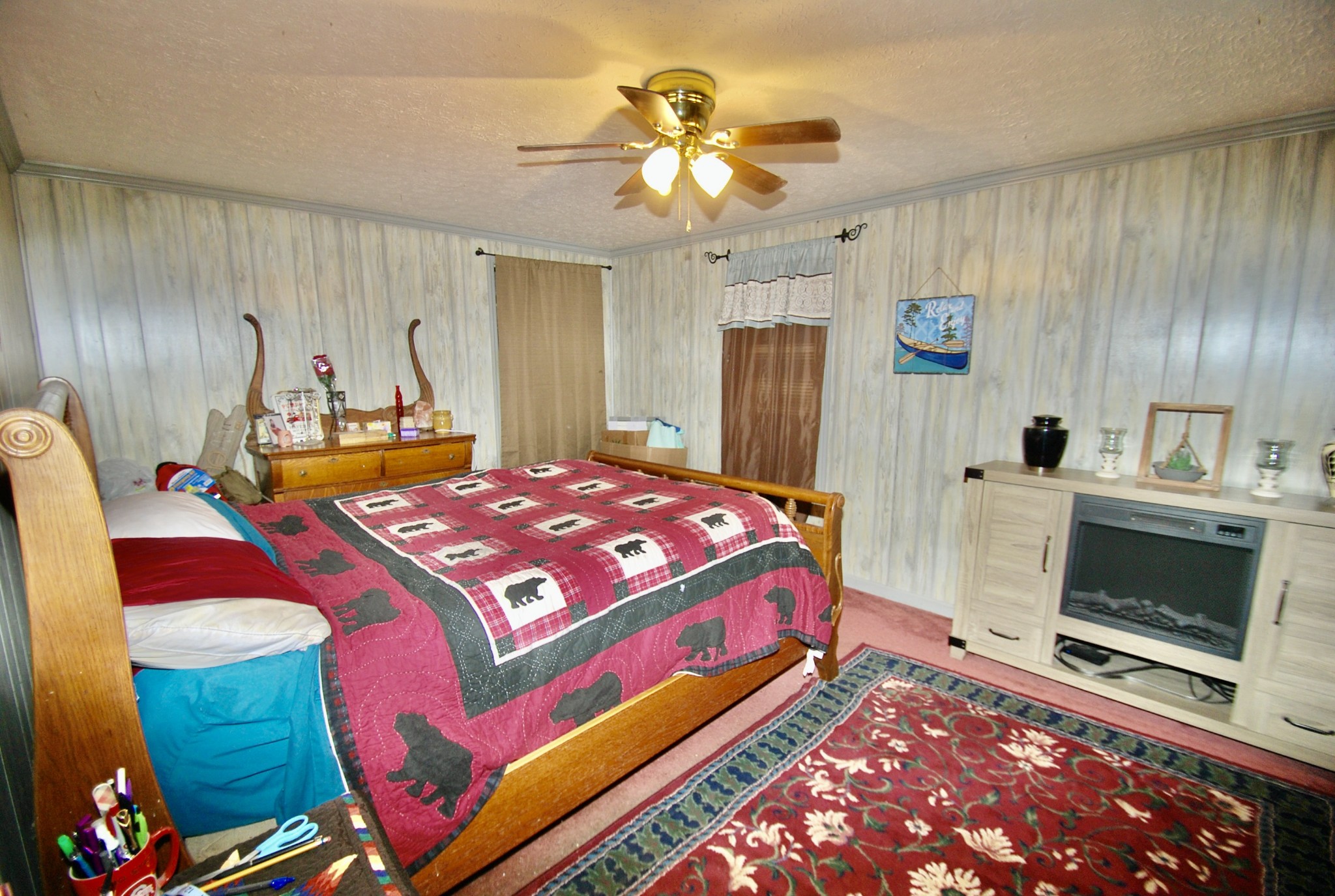 6006 Valley Road Springfield, TN 37172 - Photo 5 of 15 a bedroom with a bed and a chandelier