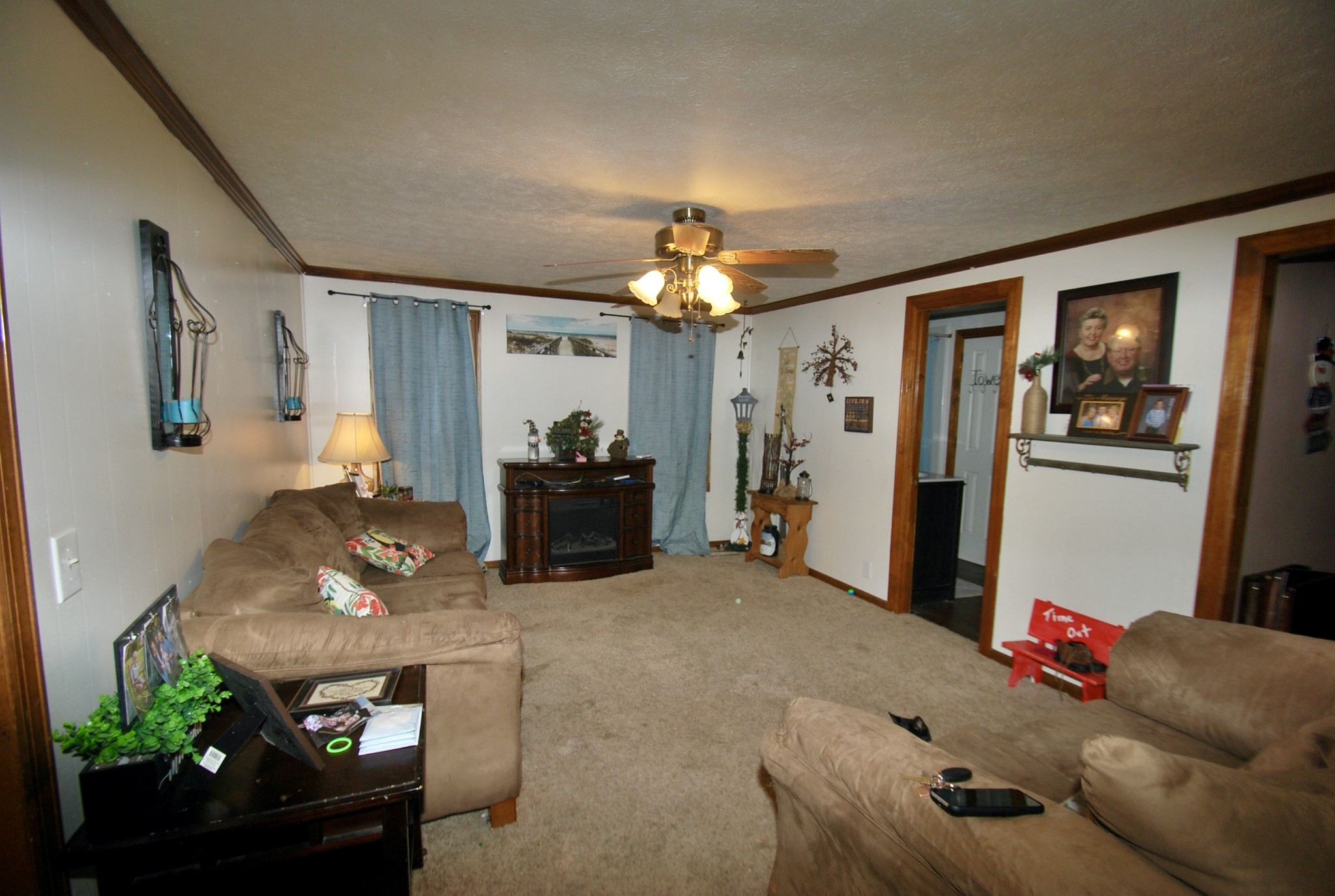 6006 Valley Road Springfield, TN 37172 - Photo 10 of 15 a living room with furniture and a chandelier