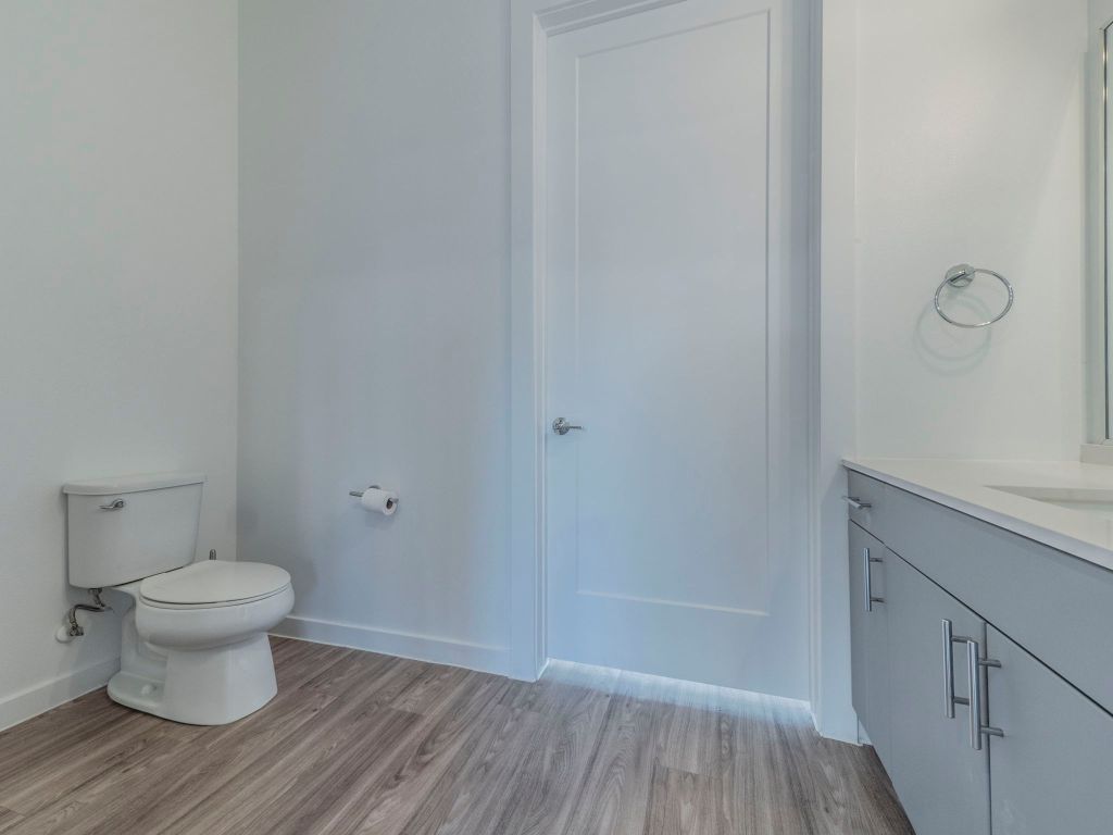 4901 Springdale Road, Unit 103 Austin, TX 78723 - Photo 12 of 26 a view of bathroom space with wooden floor