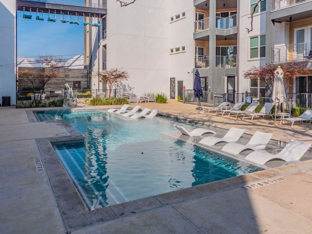 4901 Springdale Road, Unit 103 Austin, TX 78723 - Photo 24 of 26 a view of a street with tall buildings