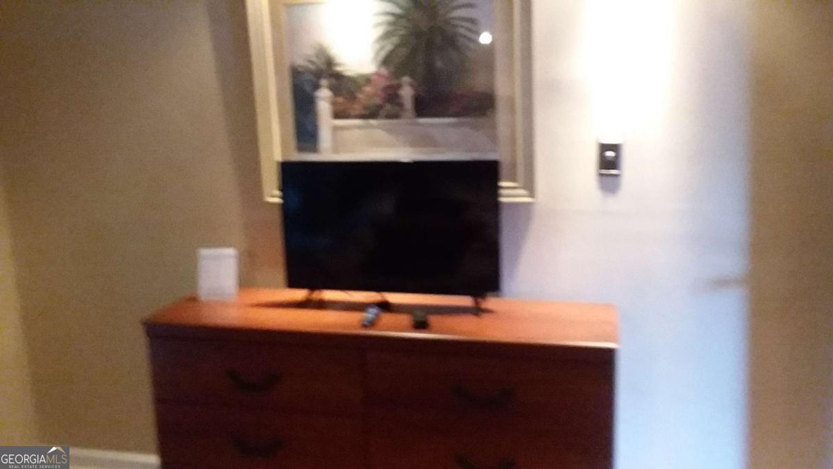 250 Little Street, Unit A301 Athens, GA 30605 - Photo 8 of 15 a bathroom with a sink and a mirror