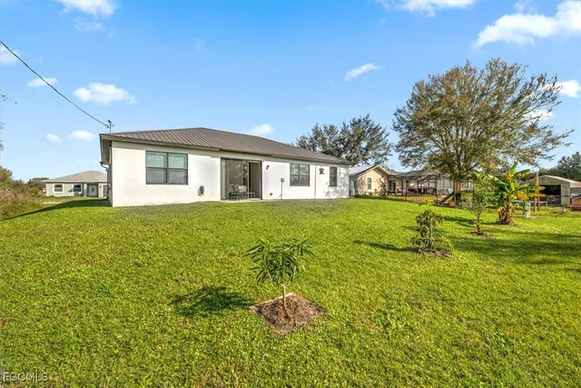 a house view with a garden space