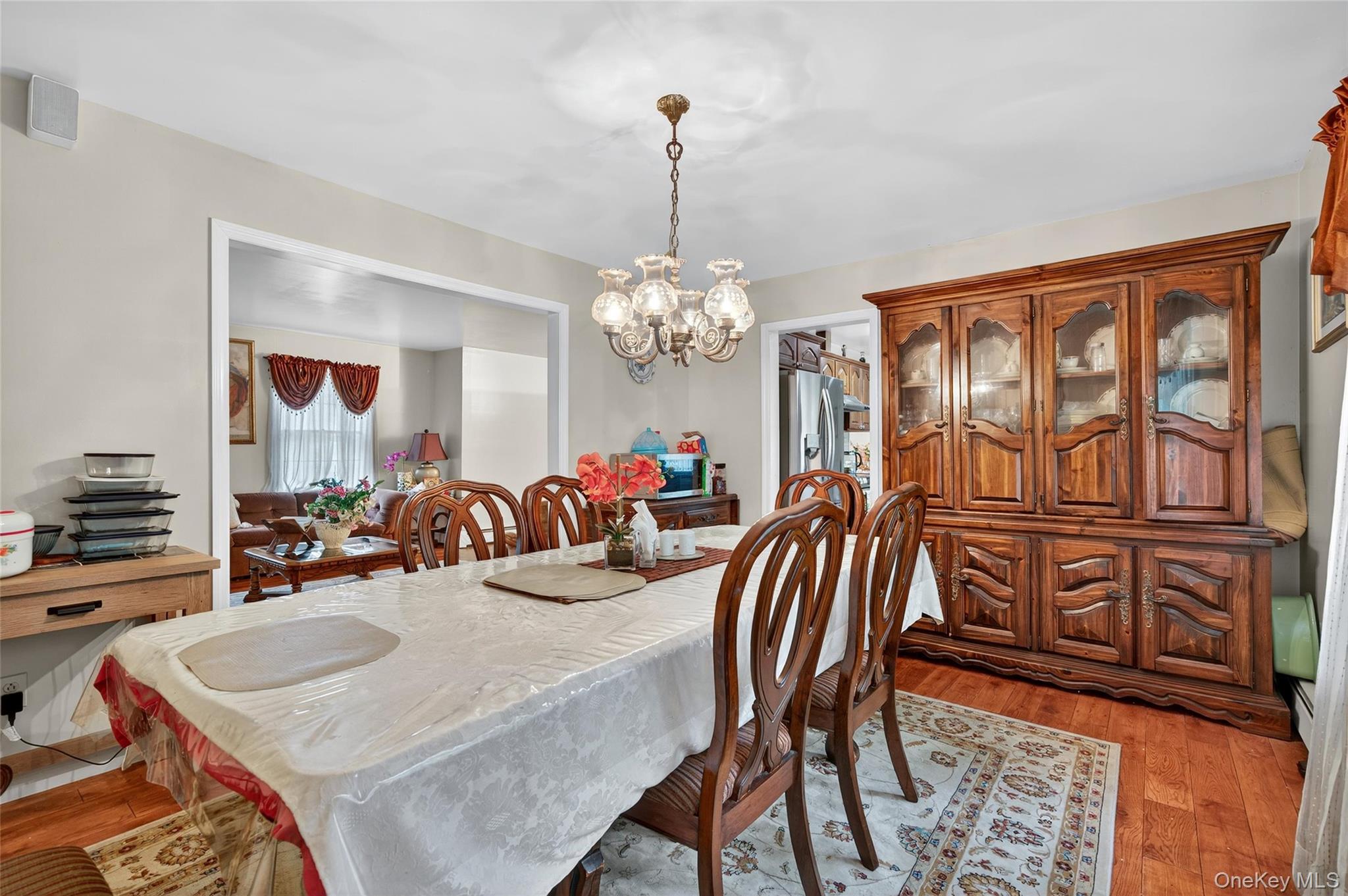 72 Peddler Hill Road Monroe, NY 10950 - Photo 16 of 50 a view of a dining room with furniture window and wooden floor