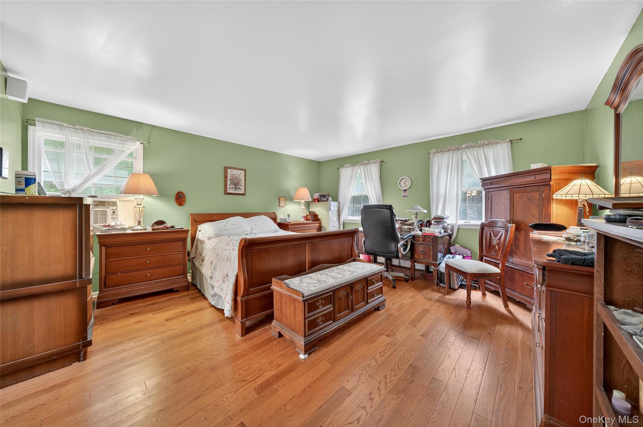 72 Peddler Hill Road Monroe, NY 10950 - Photo 27 of 50 a bedroom with furniture and a wooden floor