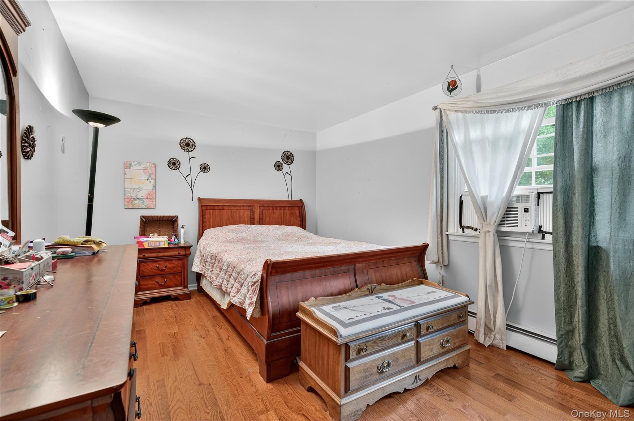 72 Peddler Hill Road Monroe, NY 10950 - Photo 35 of 50 a bed room with a bed and a chair