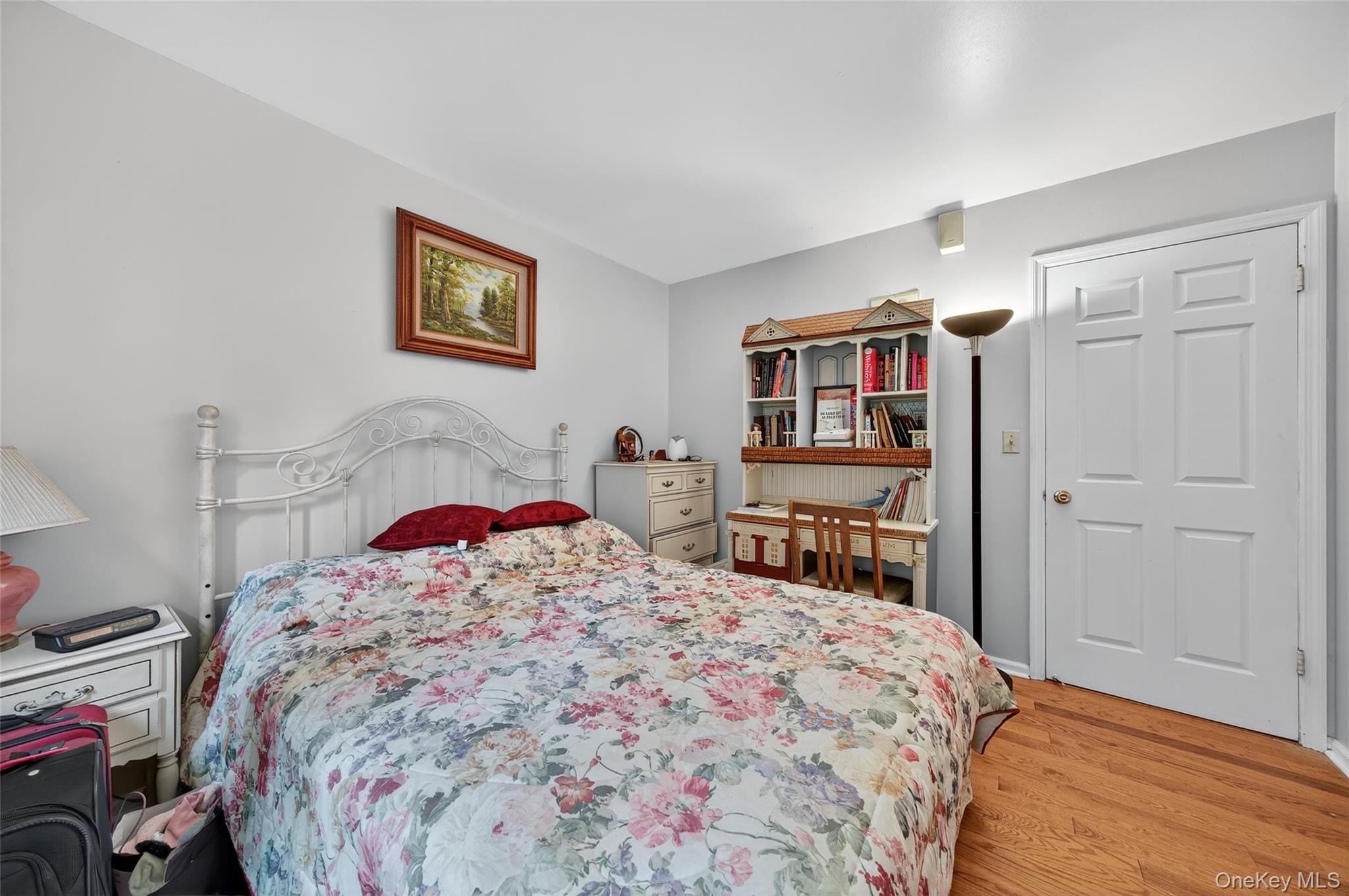 72 Peddler Hill Road Monroe, NY 10950 - Photo 40 of 50 a bedroom with a large bed and a wooden floor