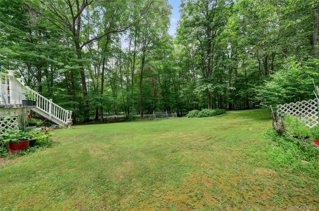a view of garden with trees