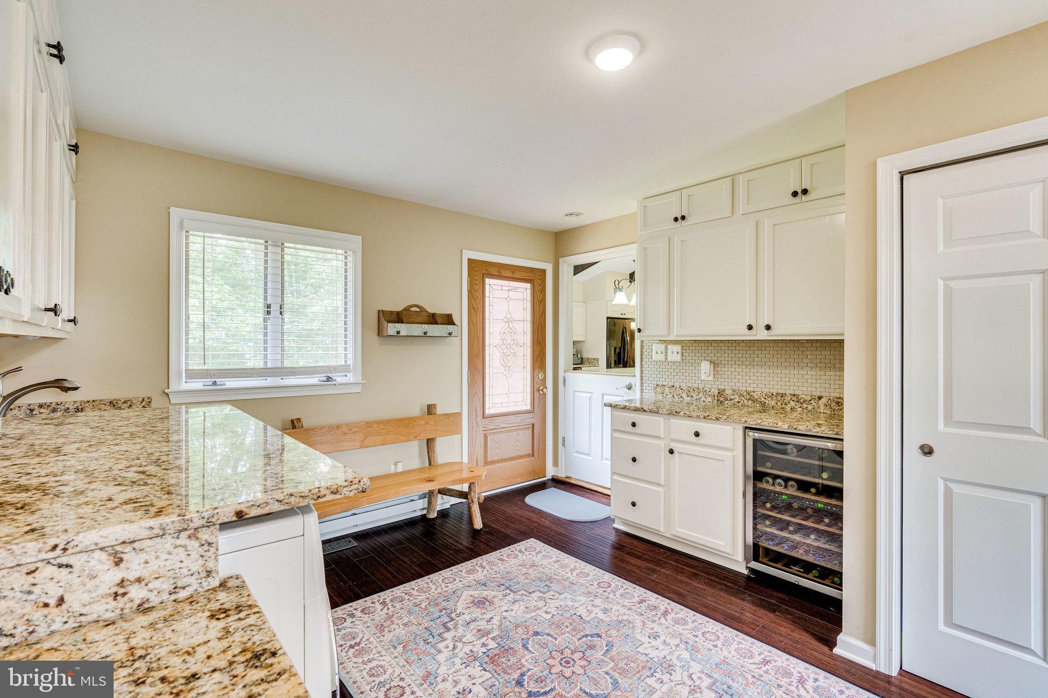 17182 Clarksridge Road Leesburg, VA 20176 - Photo 8 of 38 Granite and wine fridge