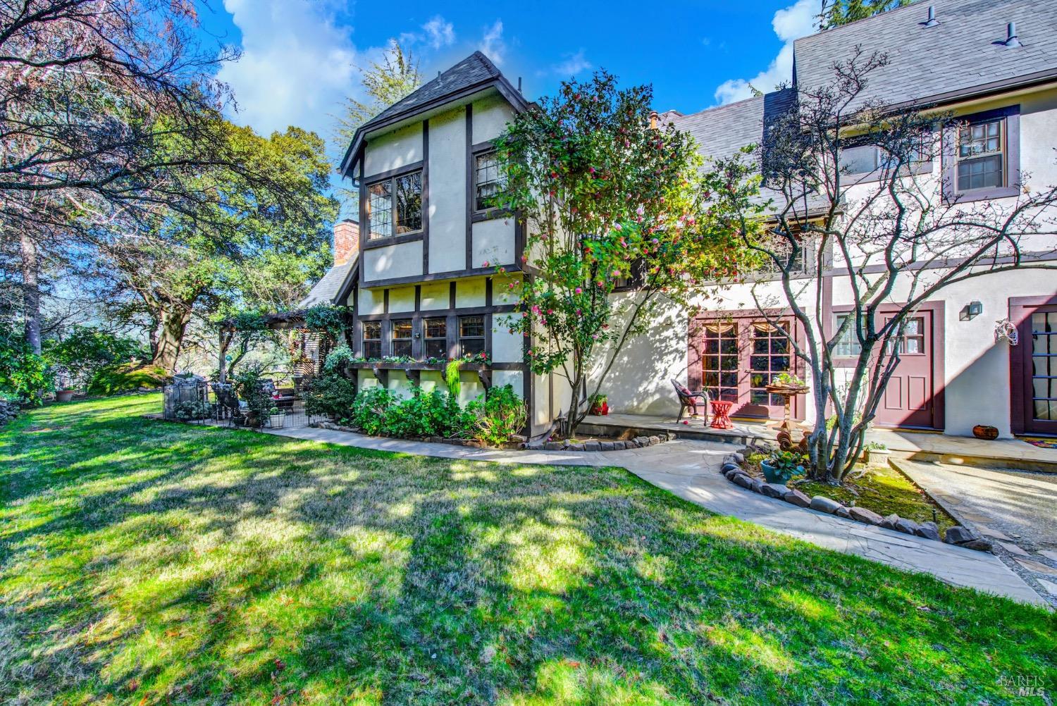 a view of a building with a yard