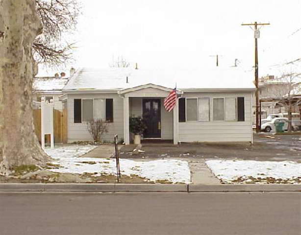 715 Jones Street Reno, NV 89503 - Photo 1 of 1 a front view of a house with a yard