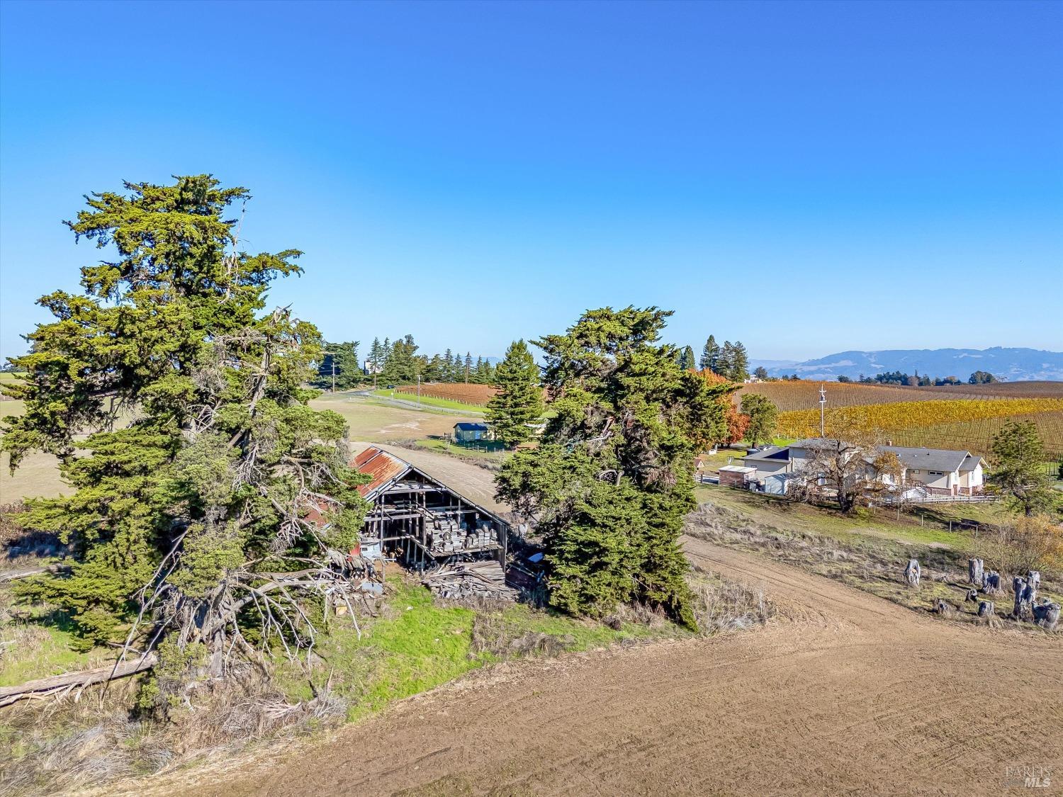 6000 Petersen Road Sebastopol, CA 95472 - Photo 14 of 25 a view of a lake with a mountain in the background