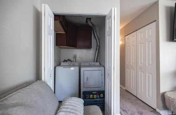 a storage room with a washer and dryer