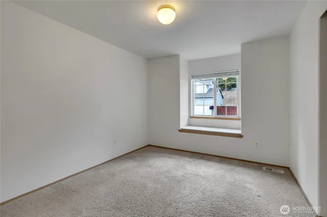 wooden floor and window in a room