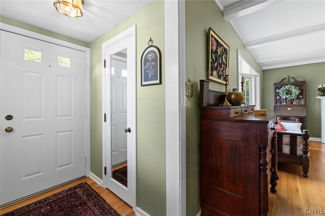 410 Meadow Road Geddes, NY 13219 - Photo 3 of 50 Vestibule with coat closet and step up that leads into the formal living room and formal dining room.
