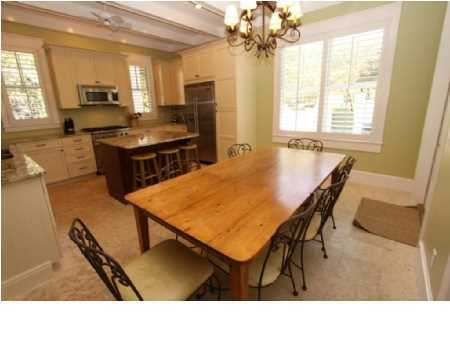 22 Round Road Rosemary Beach, FL 32461 - Photo 7 of 30 a kitchen with a table and chairs in it