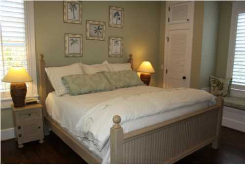 22 Round Road Rosemary Beach, FL 32461 - Photo 10 of 30 a bedroom with a bed and a lamp