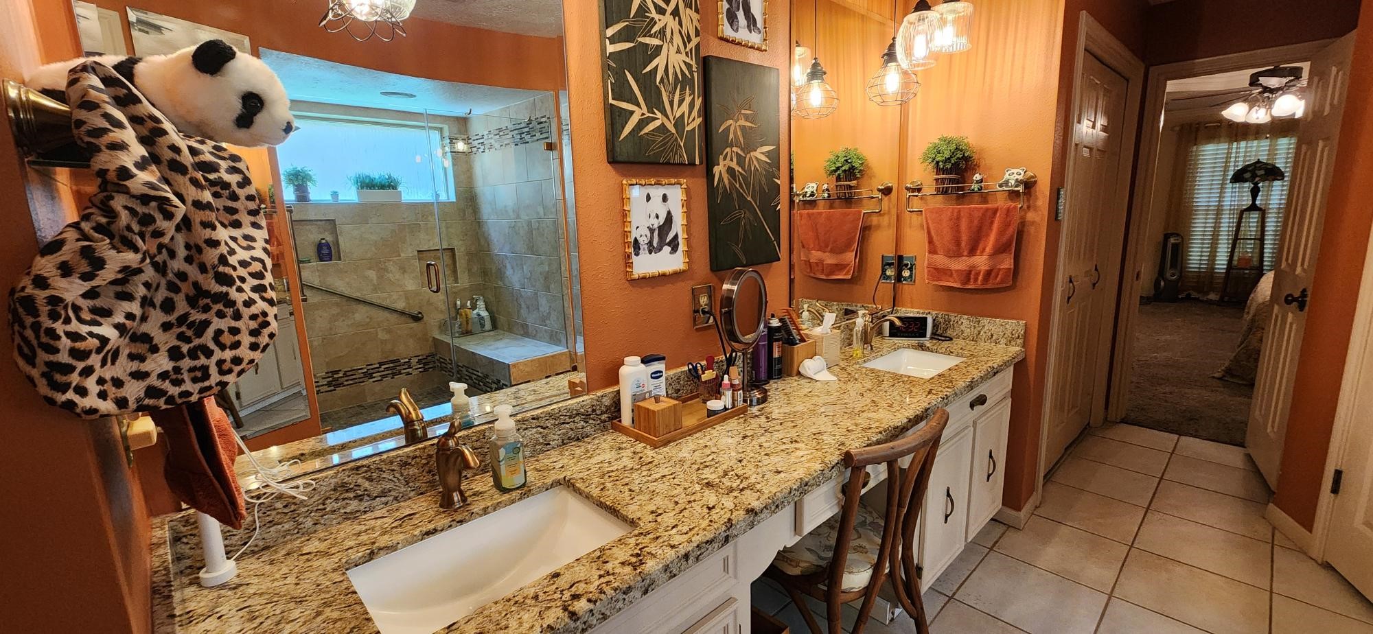 16155 Hexham Drive Spring, TX 77379 - Photo 29 of 47 a bathroom with a granite countertop sink and a mirror