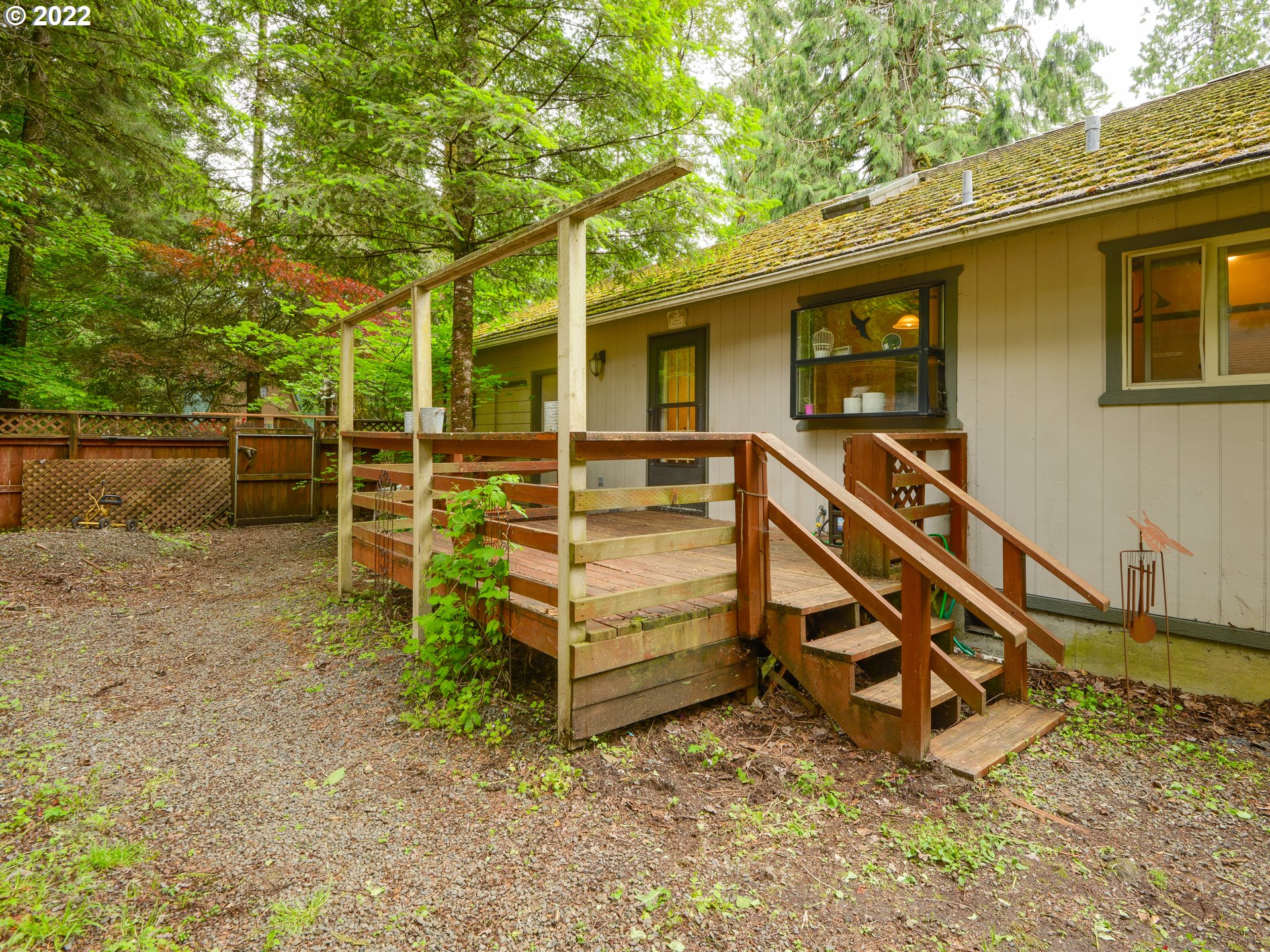 64911 East Sandy River Lane Rhododendron, OR 97049 - Photo 23 of 27 front view of a house with a yard