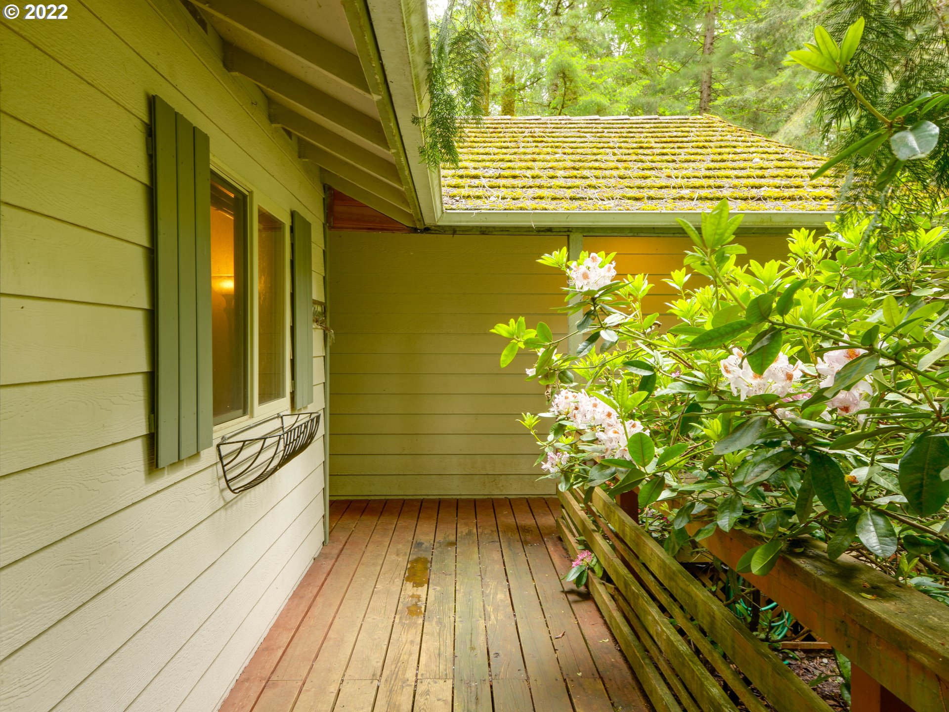 64911 East Sandy River Lane Rhododendron, OR 97049 - Photo 4 of 27 a view of a balcony with wooden floor