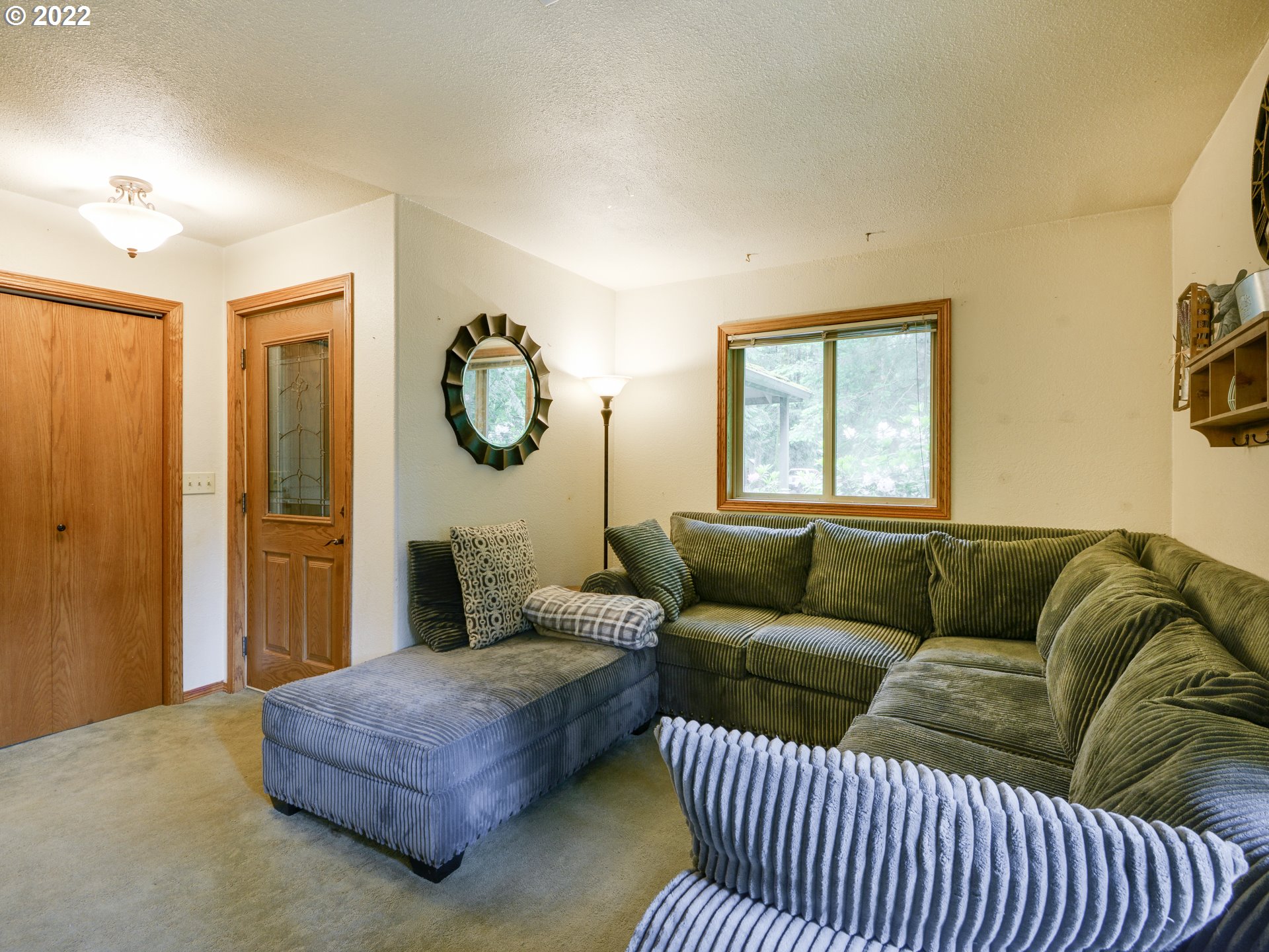 64911 East Sandy River Lane Rhododendron, OR 97049 - Photo 6 of 27 a living room with furniture