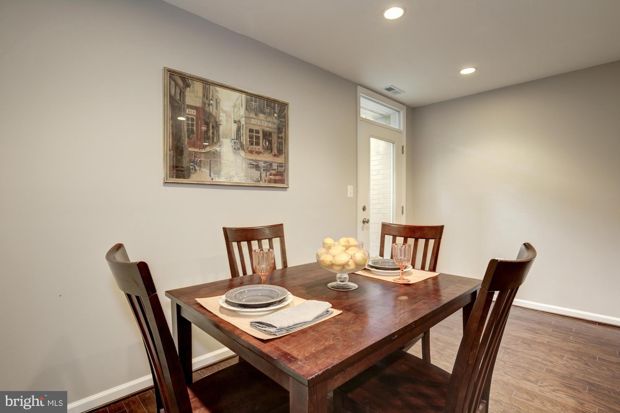 1845 Kalorama Road Northwest, Unit 1 Washington, DC 20009 - Photo 13 of 20 a view of a dining room with furniture