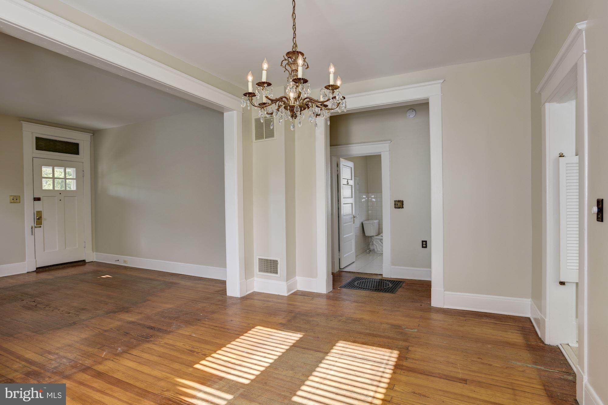 903 Arran Road Baltimore, MD 21239 - Photo 11 of 40 Off dining room is hallway to bath and BRs.